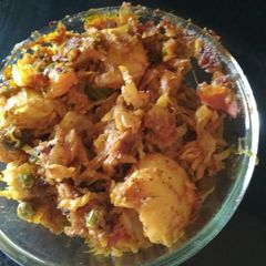 A picture of Cabbage Potatoes and peas stir fry.