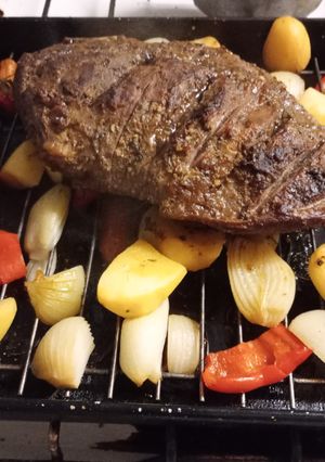Una foto de Picana al horno sobre colchón de verduras