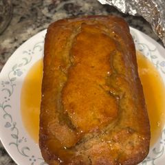 A picture of Apple cinnamon quick bread with apple cider glaze.
