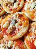 🍕ميني بيتزا بوصلة اقتصادية والنتيجة واعرة 🍕و العجينة تخرجو منها انواع وانواع تاع مملحات