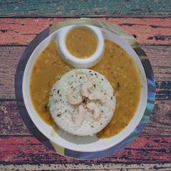 A picture of Dal fry and jeera rice.