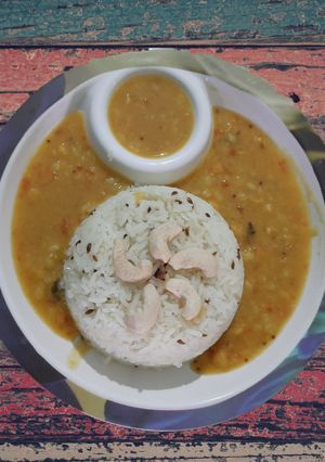 A picture of Dal fry and jeera rice.