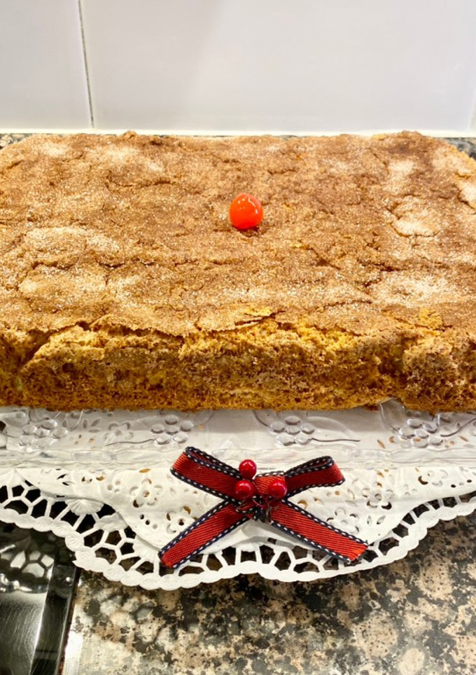 Una foto de Coca de Llanda rellena con manzanas
