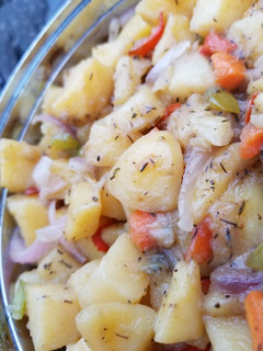 A picture of Stir fry potatoes with vegies.