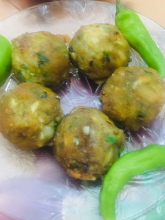 A picture of Egg potatoes balls.