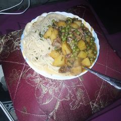 A picture of Spaghetti +stewed potatoes, minji and mutton.
