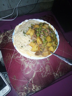 A picture of Spaghetti +stewed potatoes, minji and mutton.