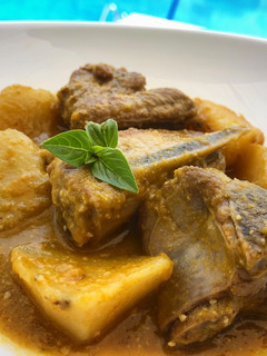 Una foto de Costillas en salsa de naranja y anacardos