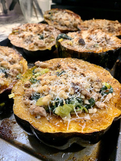 A picture of Acorn Squash with Kale and Turkey Sausage.