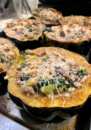 A picture of Acorn Squash with Kale and Turkey Sausage.