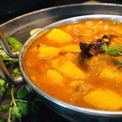 A picture of Aalo-tamatar ki sabji dhaba style.