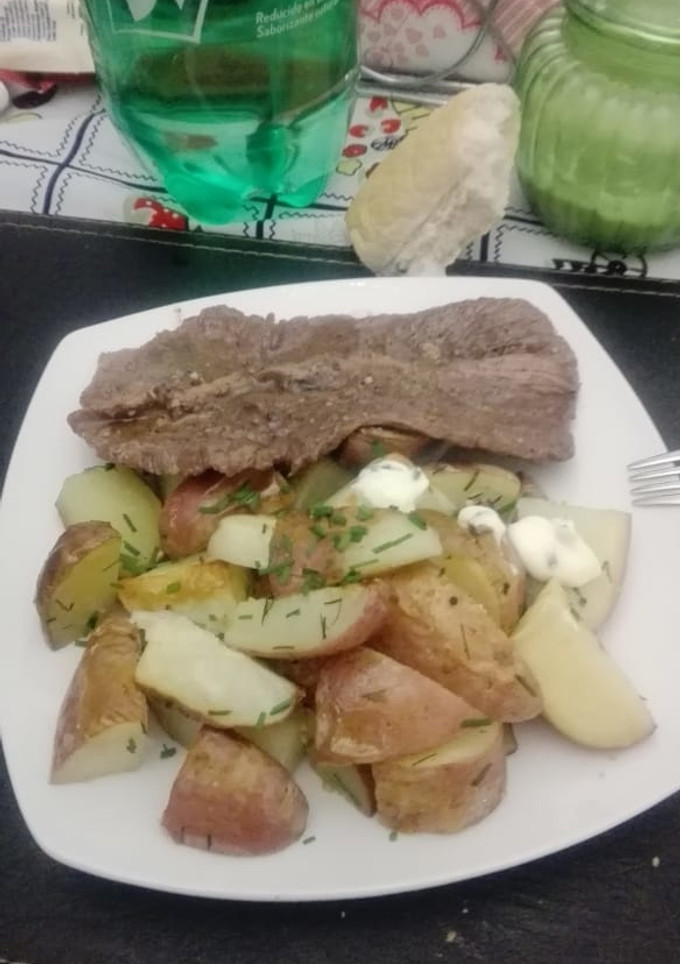 Una foto de Papas rústicas