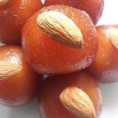 A picture of Gulab Jamun (in traditional way).