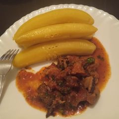 A picture of Matumbo served with bananas.