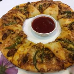 A picture of Chae Shae Sunflower pizza.