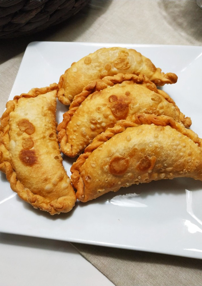 Una foto de Empanadas de pollo fritas