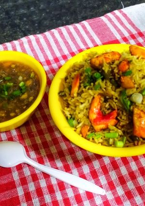 A picture of Hot and Sour Chicken Soup with Chicken fried rice.