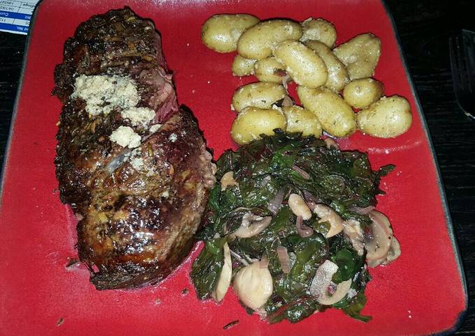Bone-in Prime rib with red chard, and mini golden potatoes