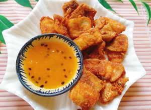 Hình của món Cá basa tẩm bột khô chiên giòn sốt chanh dây.