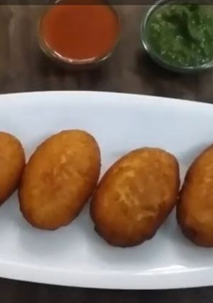 A picture of Corn and paneer bread rolls.