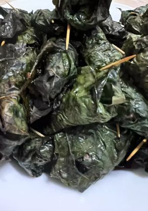 A picture of Beef Wrapped in Betel Leaves (Bò cuốn lá lốt).