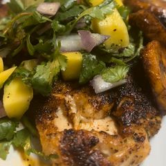 A picture of Chipotle chicken/ mango salsa.