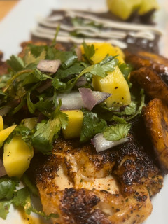 A picture of Chipotle chicken/ mango salsa.