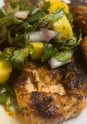 A picture of Chipotle chicken/ mango salsa.