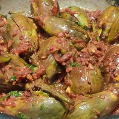 A picture of Stuffed brinjal (without sourness).