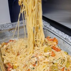 A picture of Italian Flounder Pasta with herbed cherry tomato sauce.