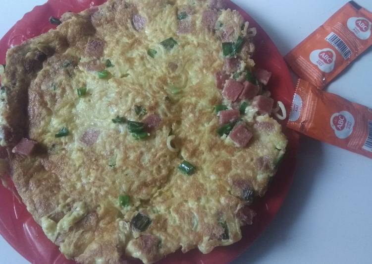 Bagaimana Membuat Omelet mie kornet yang Sempurna