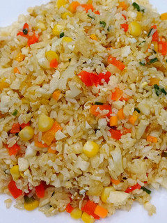 A picture of Fried Rice with Cauliflower, Bell Pepper, Carrot, and Sweet Corn.