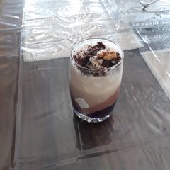 A picture of Cocoa walnut shake with ice cream.