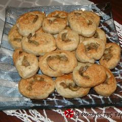 A picture of Mini olive pies in the frying pan.