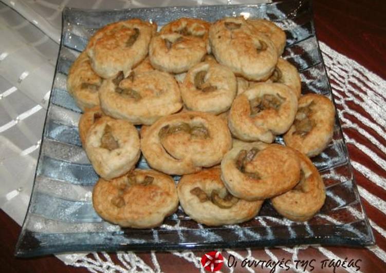 Mini olive pies in the frying pan