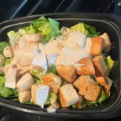 A picture of Chicken Caesar Salad - meal prep/weekly lunch grab n’ go!.