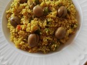Una foto de couscous con judías