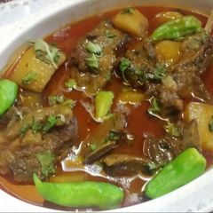 A picture of Mutton Aaluu ghosht.