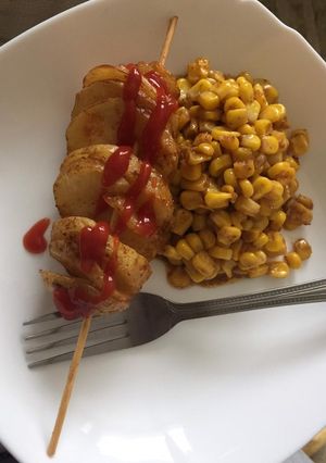A picture of Spiral potato with spicy 🌽 corn 😋.