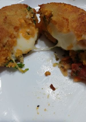 Una foto de Croqueta de calabaza rellena de acelga y queso sin harina