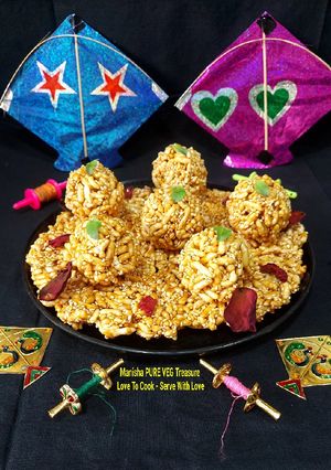 तिल मुरमुरा चिक्की लड्डू (Til murmura chikki laddu recipe in Hindi) रेसिपी मुख्य फोटो
