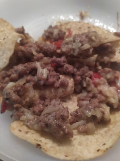 Una foto de Nachos con carne trufada