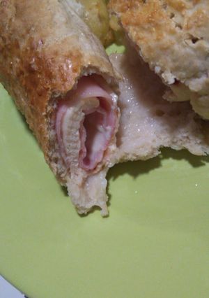 Una foto de Rollos de pollo relleno