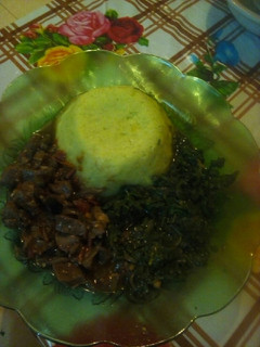 A picture of Mashed potatoes, liver n fried vegs.