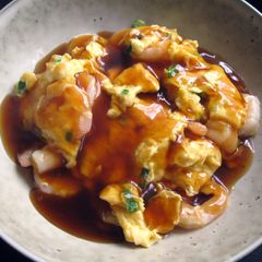 A picture of Prawns & Egg with Sweet Sour Sauce.