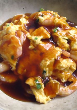 A picture of Prawns & Egg with Sweet Sour Sauce.