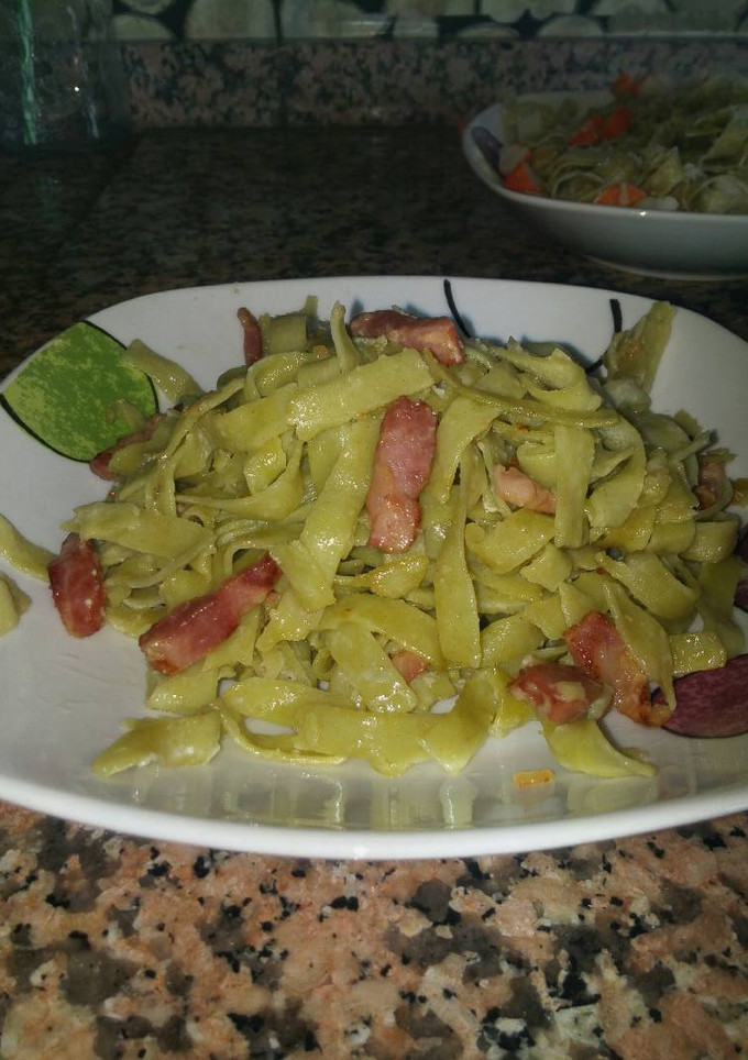 Una foto de Nidos de espinacas con bacon