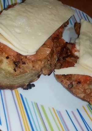Una foto de Milanesas de berenjenas napolitana 🍆🧀