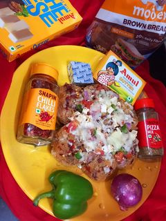ब्रेड पिज़्ज़ा बम (Bread Pizza Bomb ki recipe in hindi) रेसिपी मुख्य फोटो