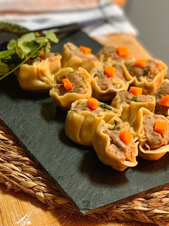 Una foto de Dim sum de cerdo al vapor